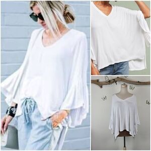 Anthropologie akemi and kim flutter sleeve poncho